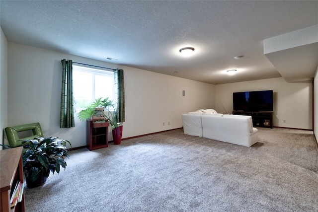 interior space featuring a textured ceiling and light colored carpet