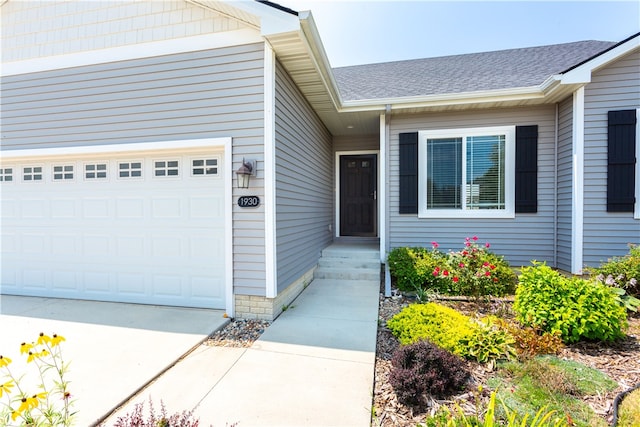 entrance to property with a garage