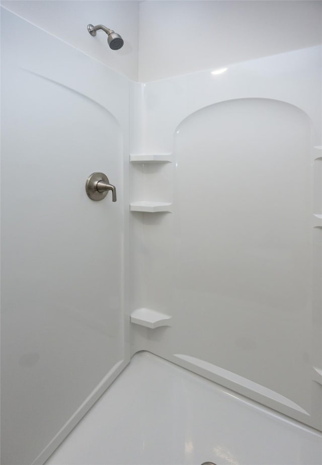 bathroom with a shower