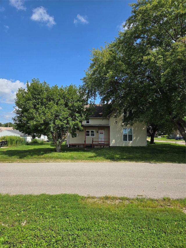 view of front of home with a front yard