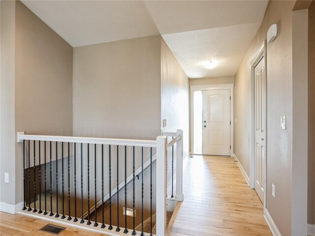 hallway featuring light hardwood / wood-style floors