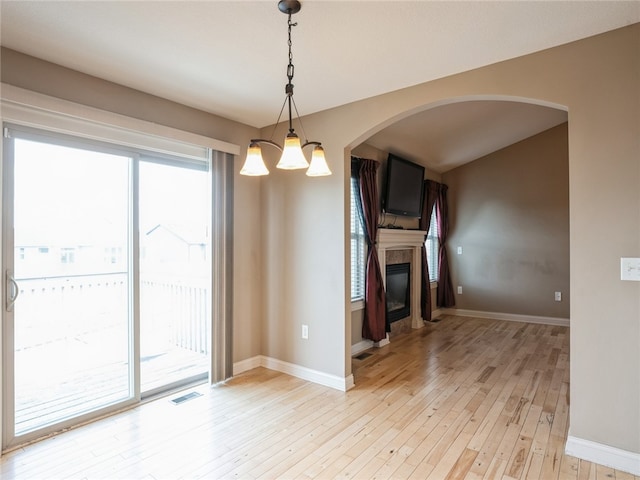 unfurnished living room with light wood-type flooring