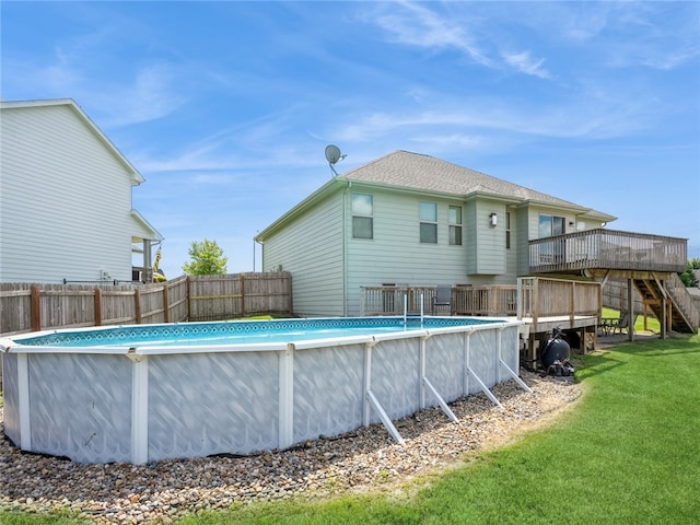 view of swimming pool featuring a deck