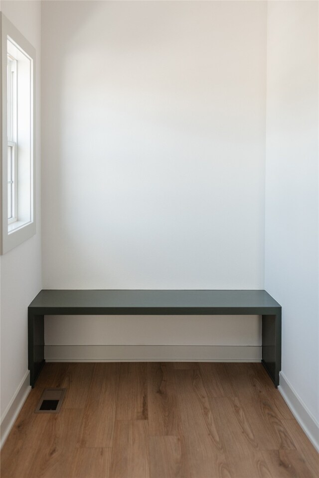 spare room with light hardwood / wood-style flooring