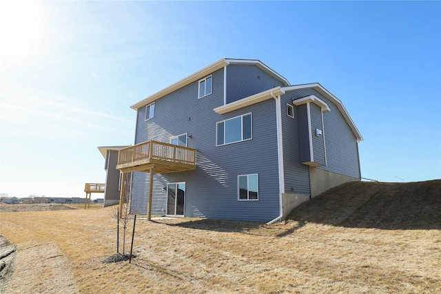 rear view of house with a deck