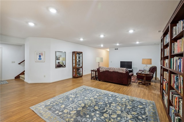 living room with light hardwood / wood-style floors