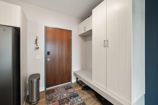 mudroom with light wood-type flooring