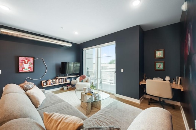 living room with light hardwood / wood-style floors