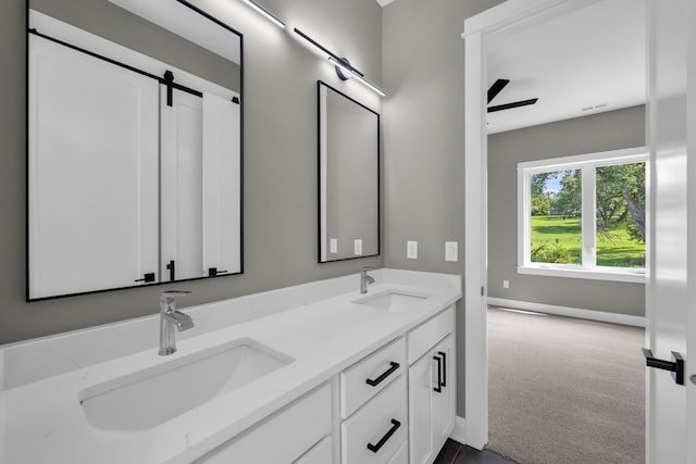 bathroom featuring double vanity