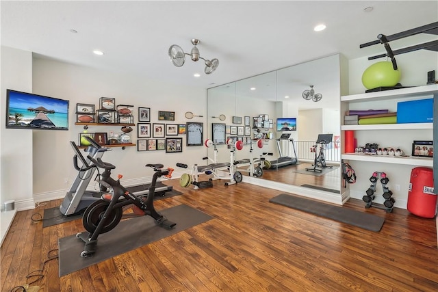 4701 150th St, Urbandale, IA 50323 - exercise room featuring wood finished floors, recessed lighting, and baseboards