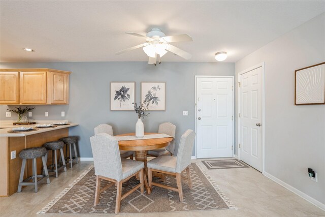 dining room with recessed lighting, a ceiling fan, and baseboards