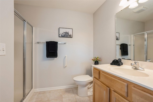 bathroom featuring visible vents, toilet, a shower stall, tile patterned flooring, and vanity