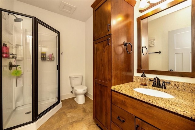 bathroom with tile patterned flooring, toilet, vanity, and a shower with shower door