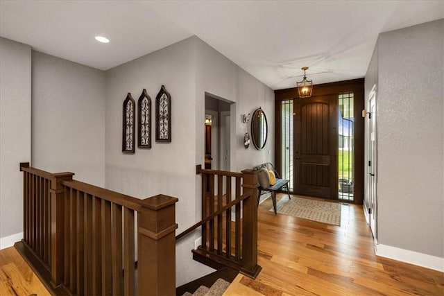 entryway with light hardwood / wood-style floors