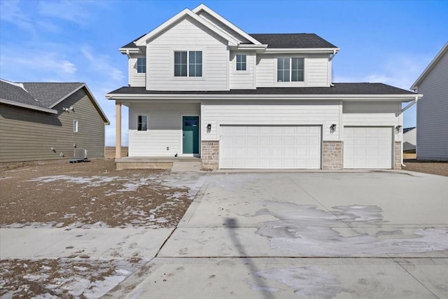 view of front of home with a garage