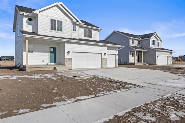 view of front of property with a garage