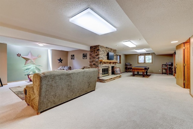 living room with billiards, a textured ceiling, a brick fireplace, carpet, and brick wall