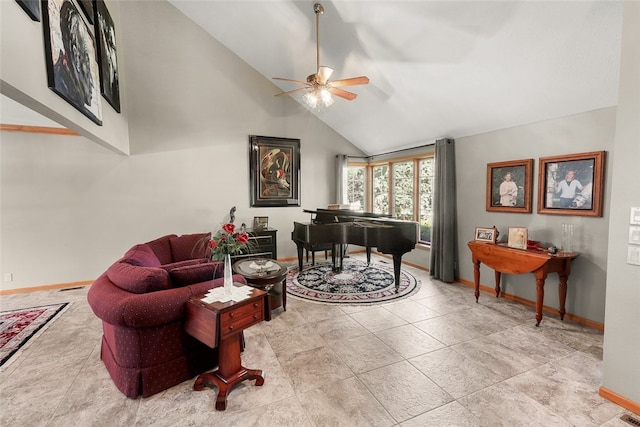 living room with high vaulted ceiling and ceiling fan