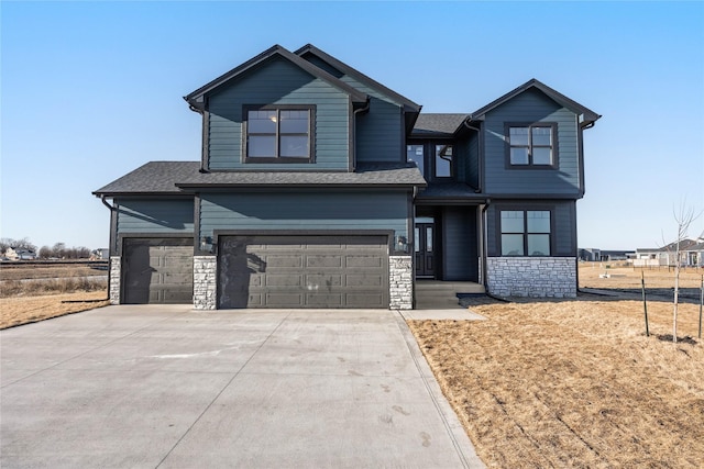 view of front of property with a garage