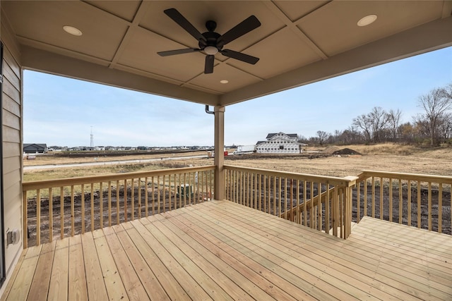 wooden terrace featuring ceiling fan