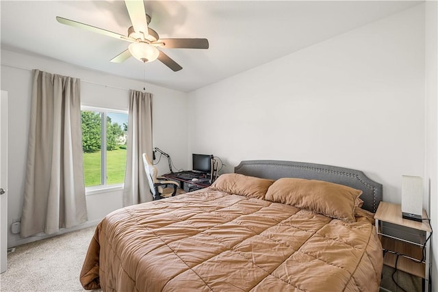 bedroom featuring ceiling fan and carpet flooring