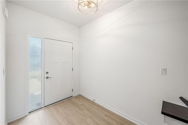 entrance foyer with light hardwood / wood-style floors