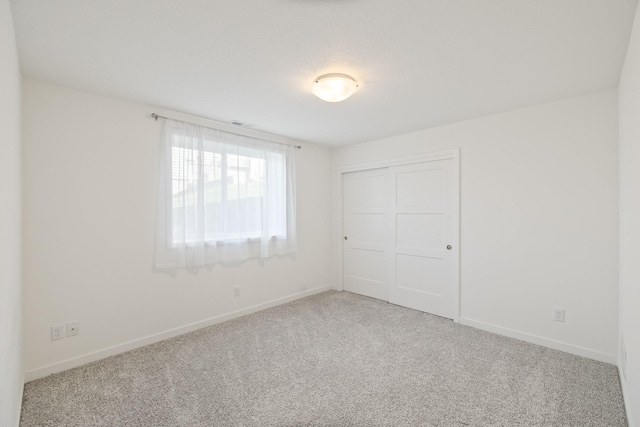 96 Keeneland Ct, Pleasant Hill, IA 50327 - spare room with baseboards and carpet flooring