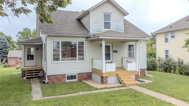 bungalow-style house with a front lawn