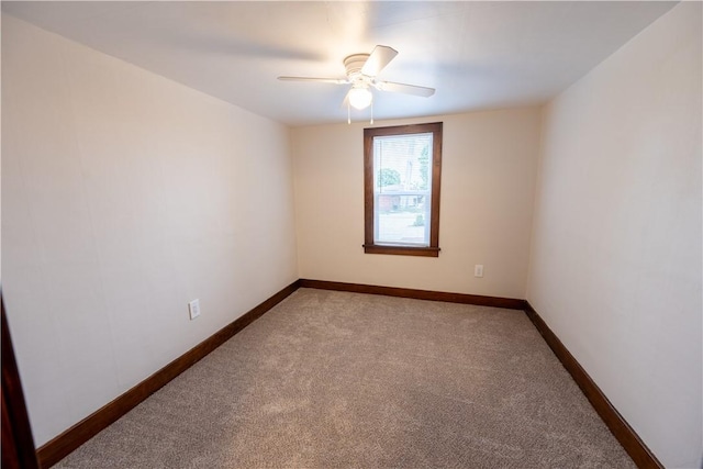 unfurnished room featuring carpet floors and ceiling fan