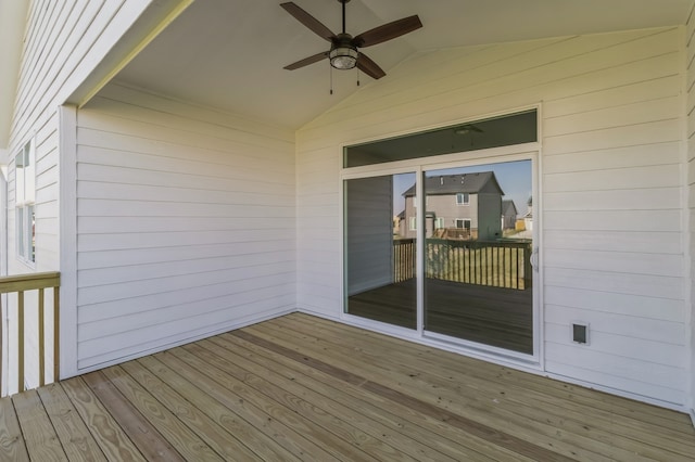 wooden terrace featuring ceiling fan