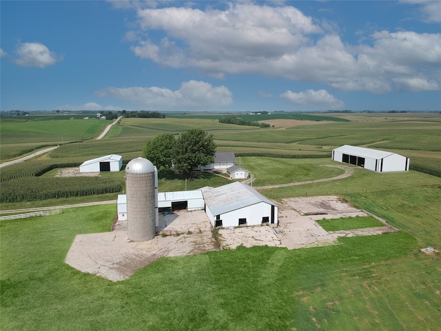 view of home's community with an outbuilding and a rural view