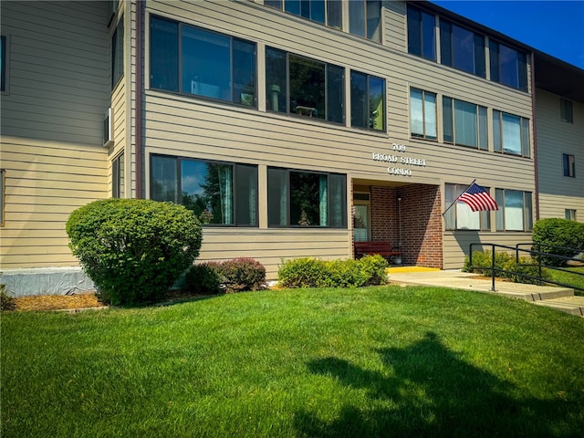 view of front of home with a front yard