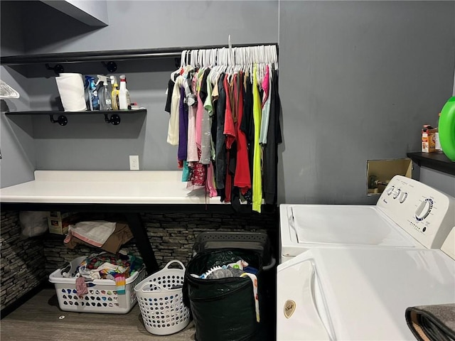 507 E Main St, Le Grand, IA 50142 - laundry room with separate washer and dryer and wood finished floors