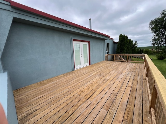 wooden terrace featuring french doors