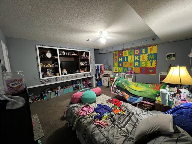 507 E Main St, Le Grand, IA 50142 - bedroom featuring carpet flooring, a textured ceiling, and a ceiling fan