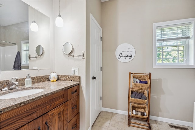 bathroom featuring vanity and tile patterned floors