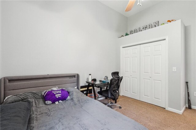 bedroom featuring carpet, a closet, and ceiling fan