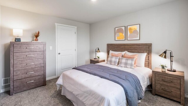 bedroom featuring carpet, visible vents, and baseboards