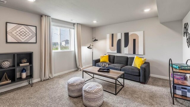 living room featuring visible vents, baseboards, recessed lighting, and carpet
