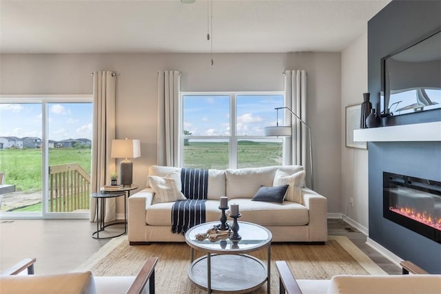 living room featuring a wealth of natural light