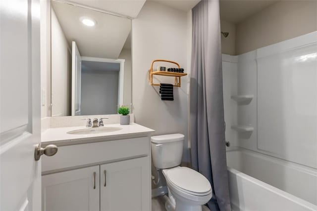 full bathroom with vanity, toilet, and shower / bath combo with shower curtain