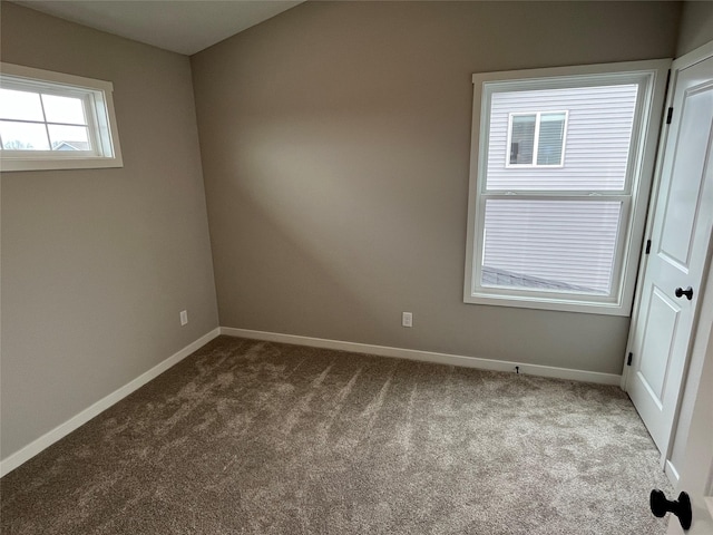 unfurnished room with carpet floors