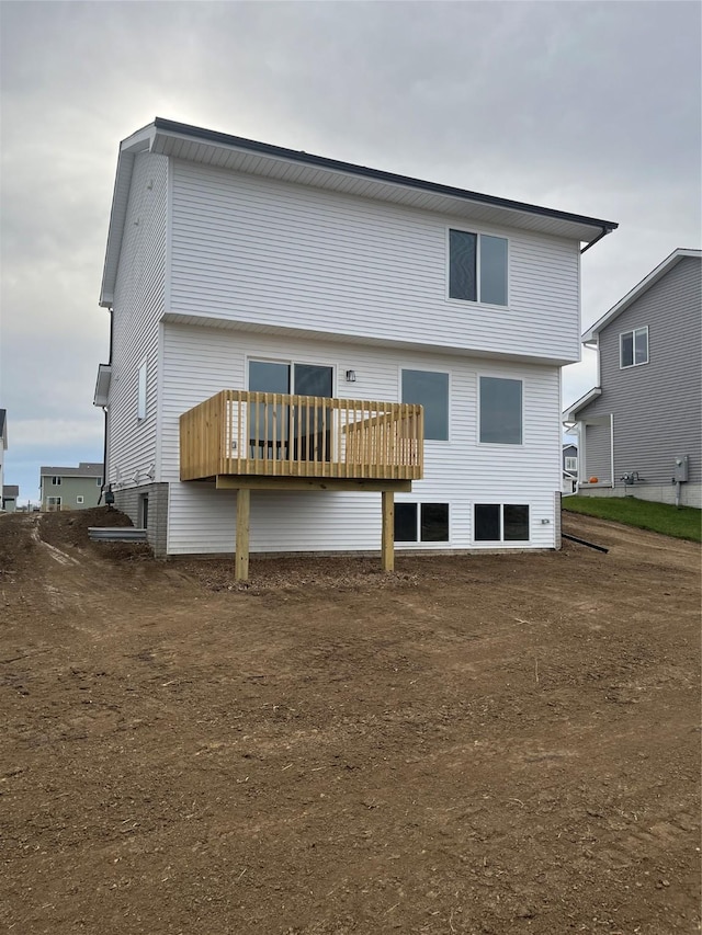 rear view of property with a deck