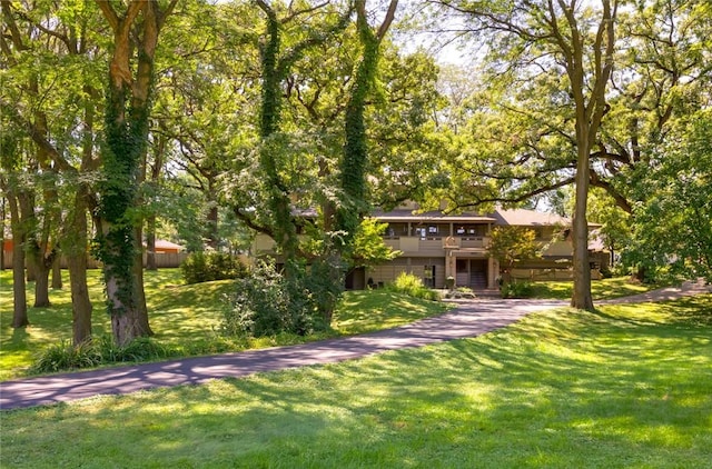 exterior space with a lawn