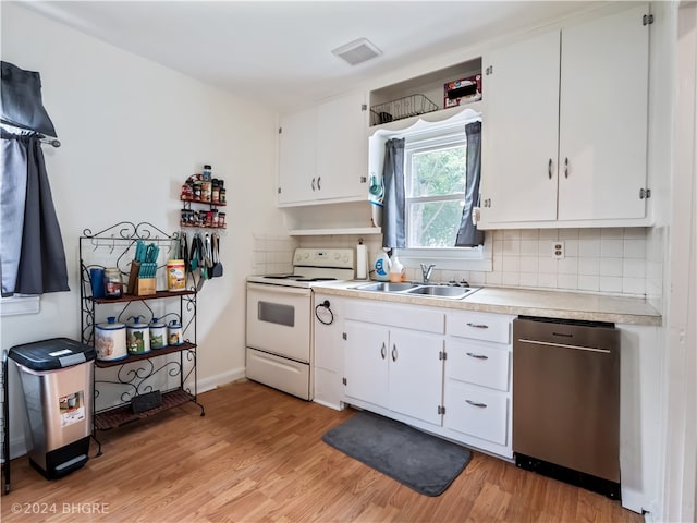 kitchen featuring light countertops, electric range, a sink, light wood-type flooring, and dishwasher