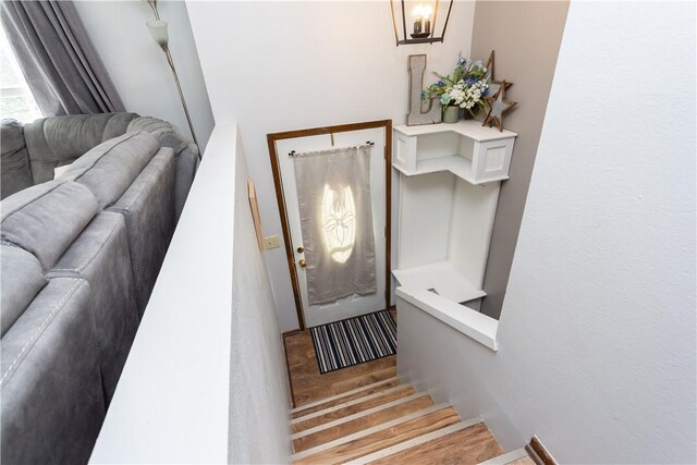 foyer entrance with light wood-type flooring