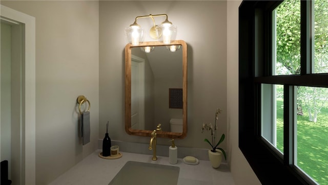 bathroom with a sink and toilet