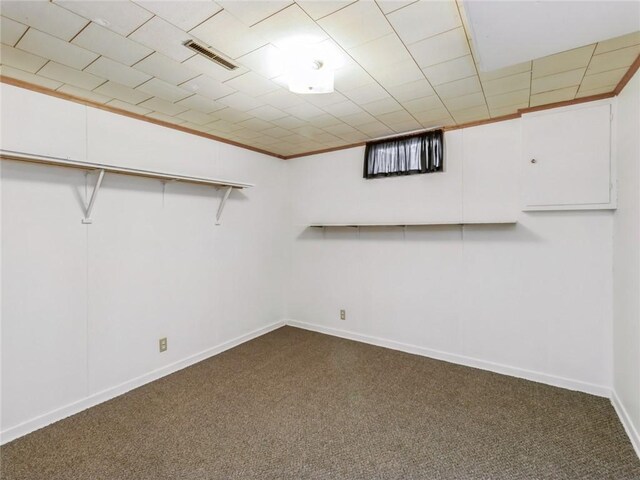 basement featuring carpet flooring