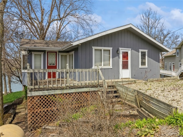 view of front of property with a wooden deck