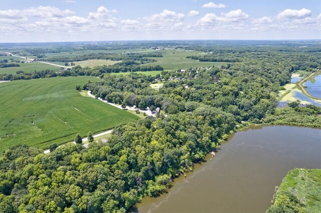 aerial view with a rural view and a water view